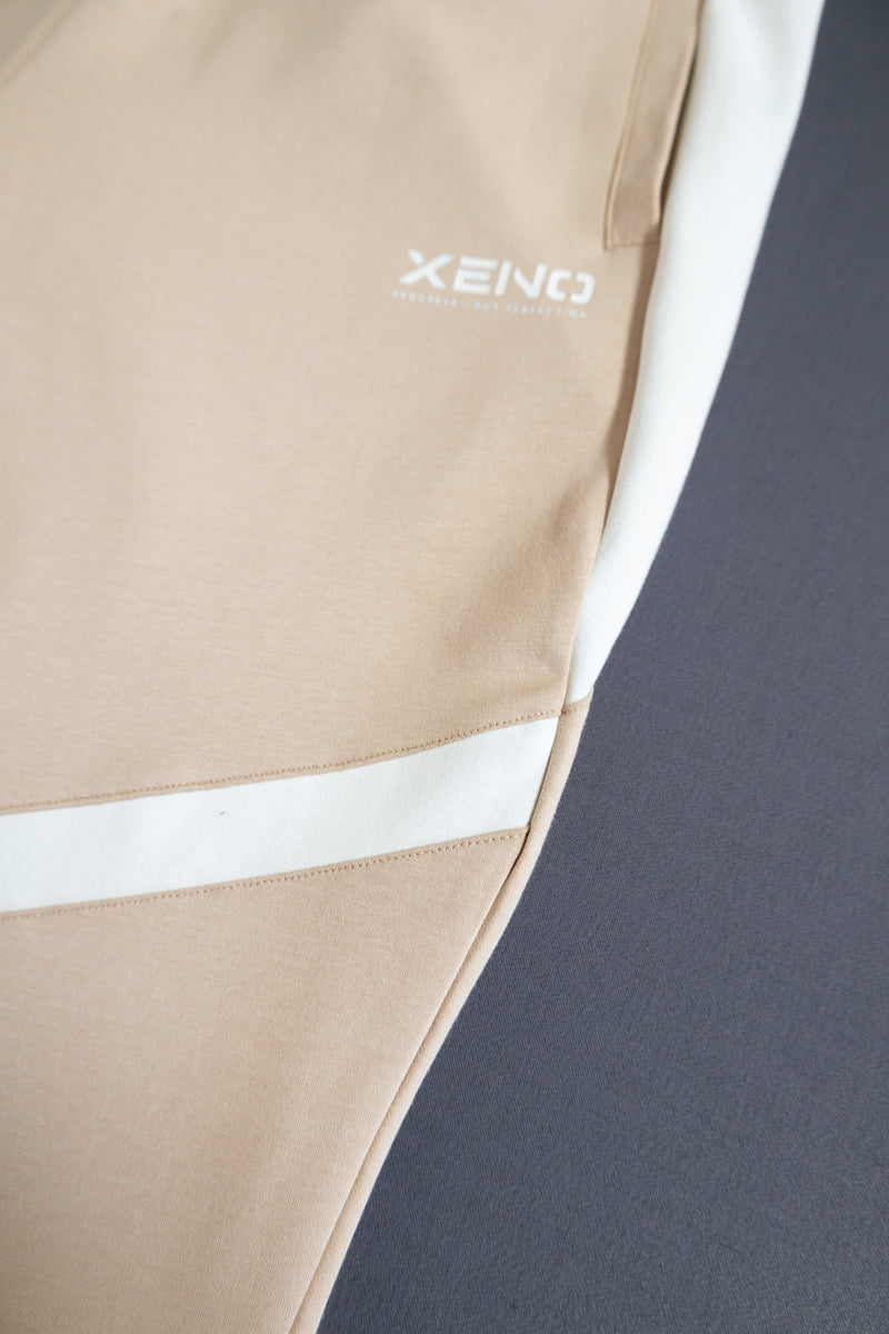 XENO COLOR BLOCK TAPERED PANTS Beige x White