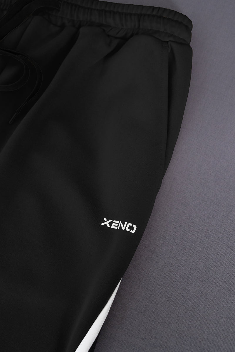 XENO DIAGONAL LINE PANTS BLACK x WHITE