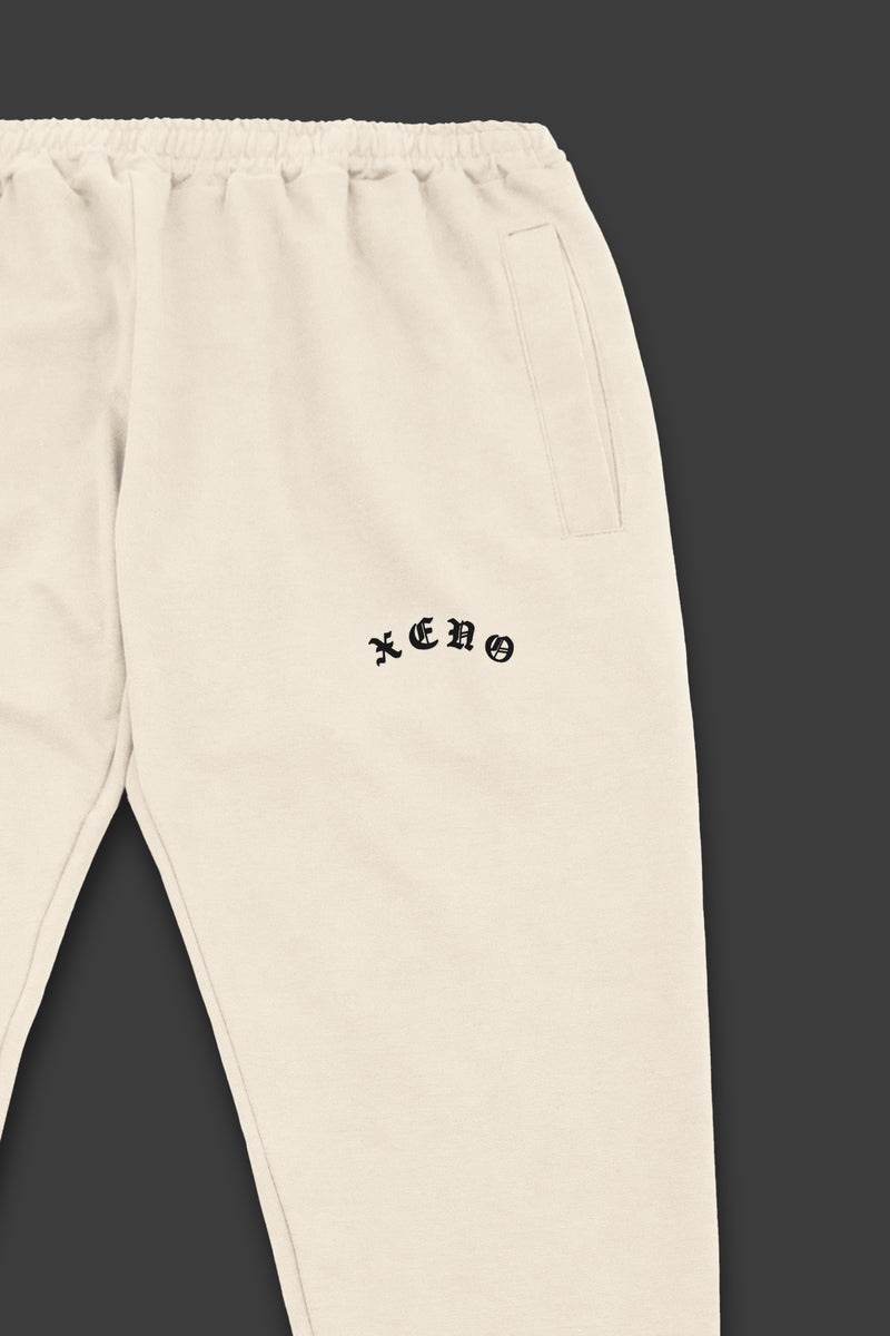 XENO BLACK LETTER SWEAT PANTS NATURAL