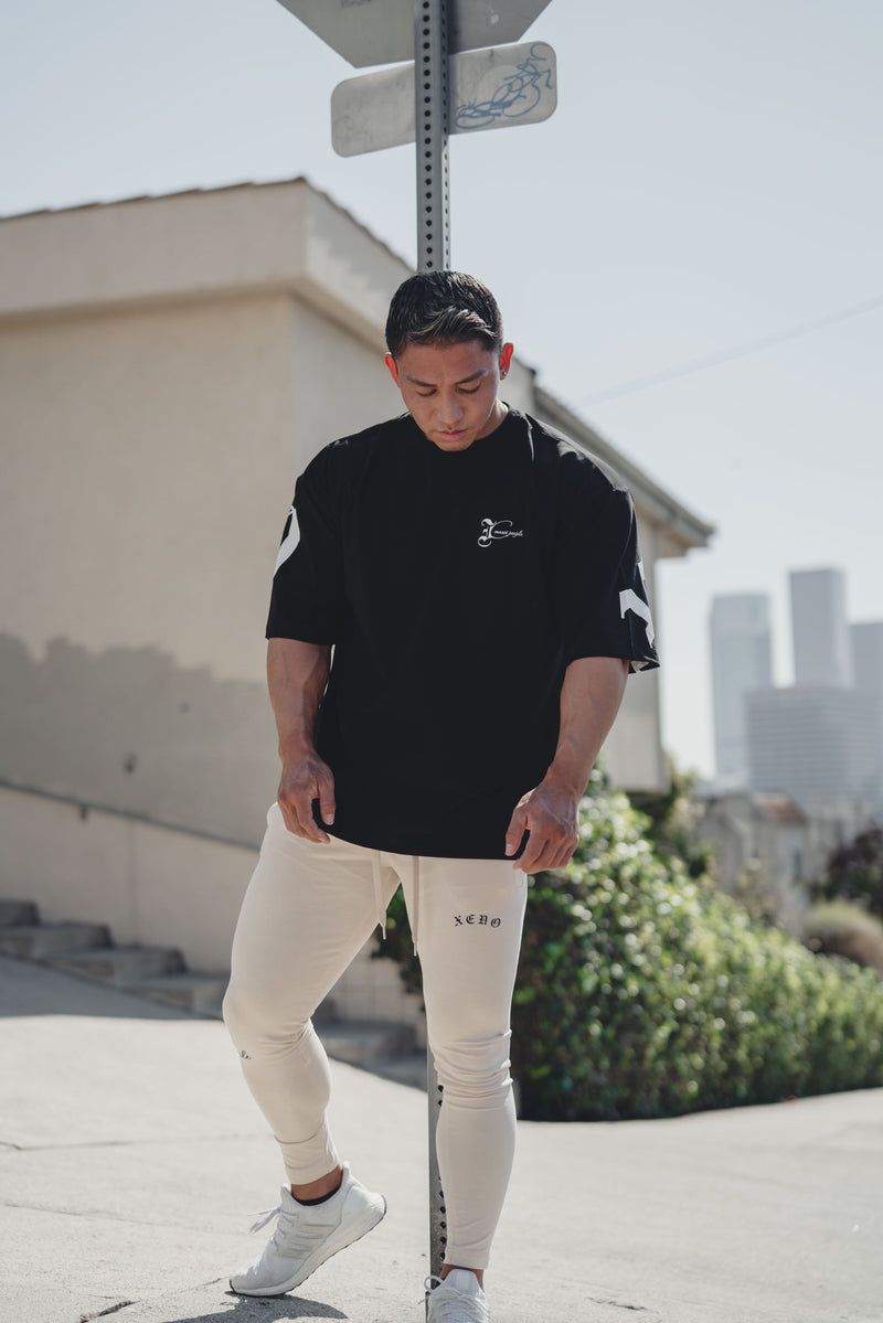 XENO BLACK LETTER SWEAT PANTS NATURAL