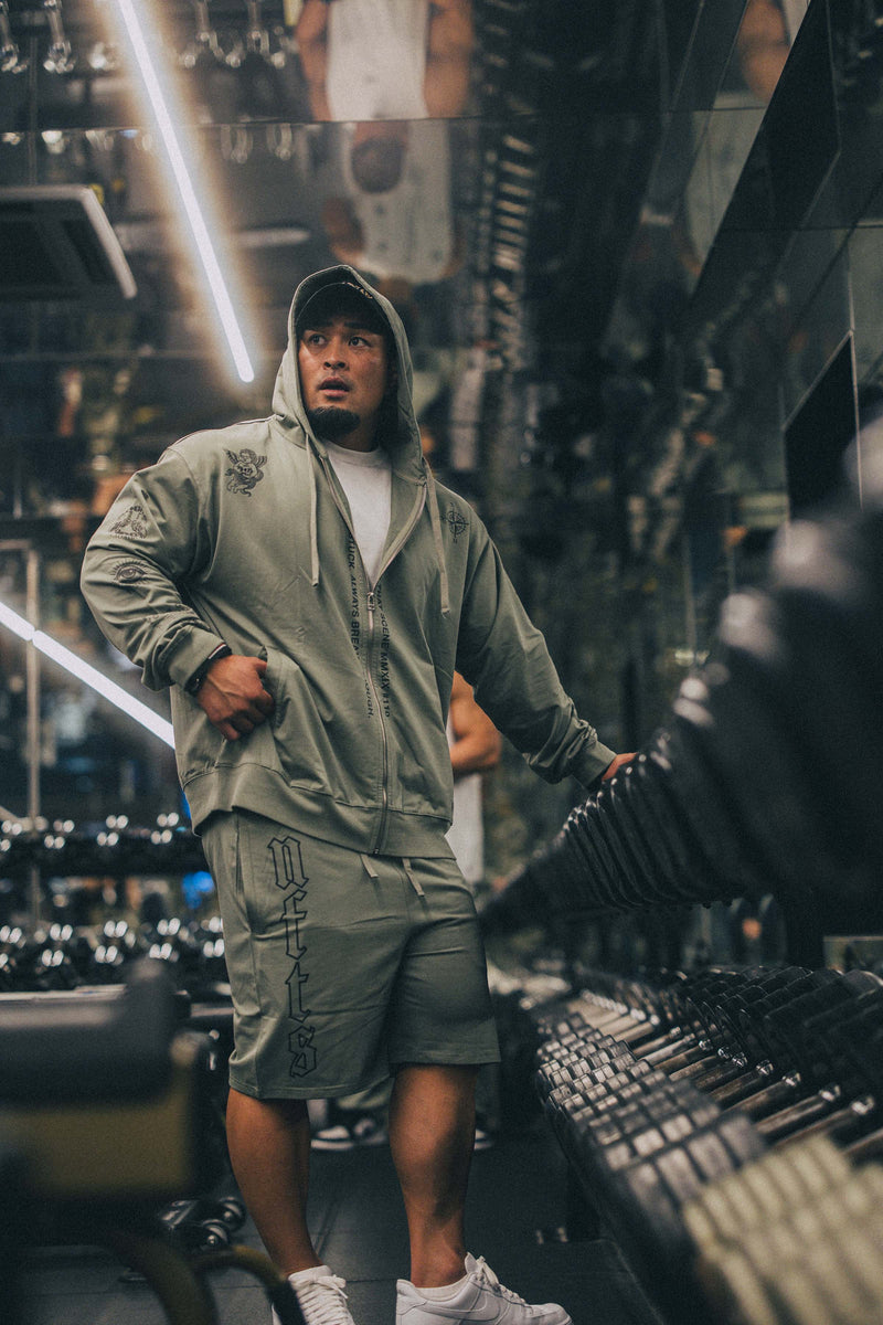 XENO “NFTS” SWEAT SHORTS GREEN GRAY