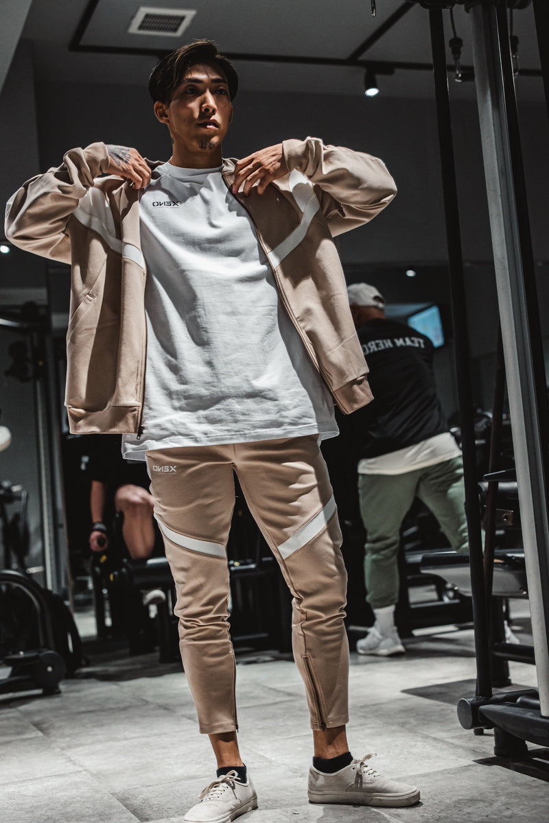 XENO COLOR BLOCK TAPERED PANTS Beige x White