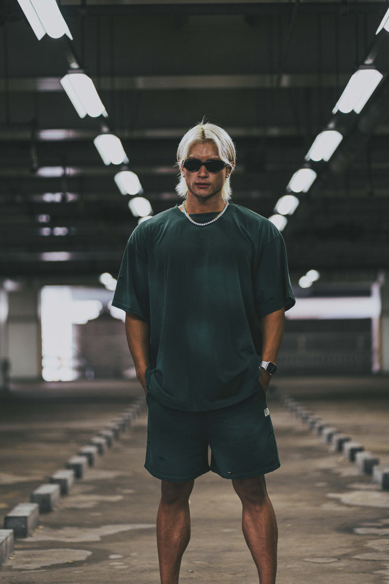 XENO DAMAGE SWEAT SHORT PANTS GREEN