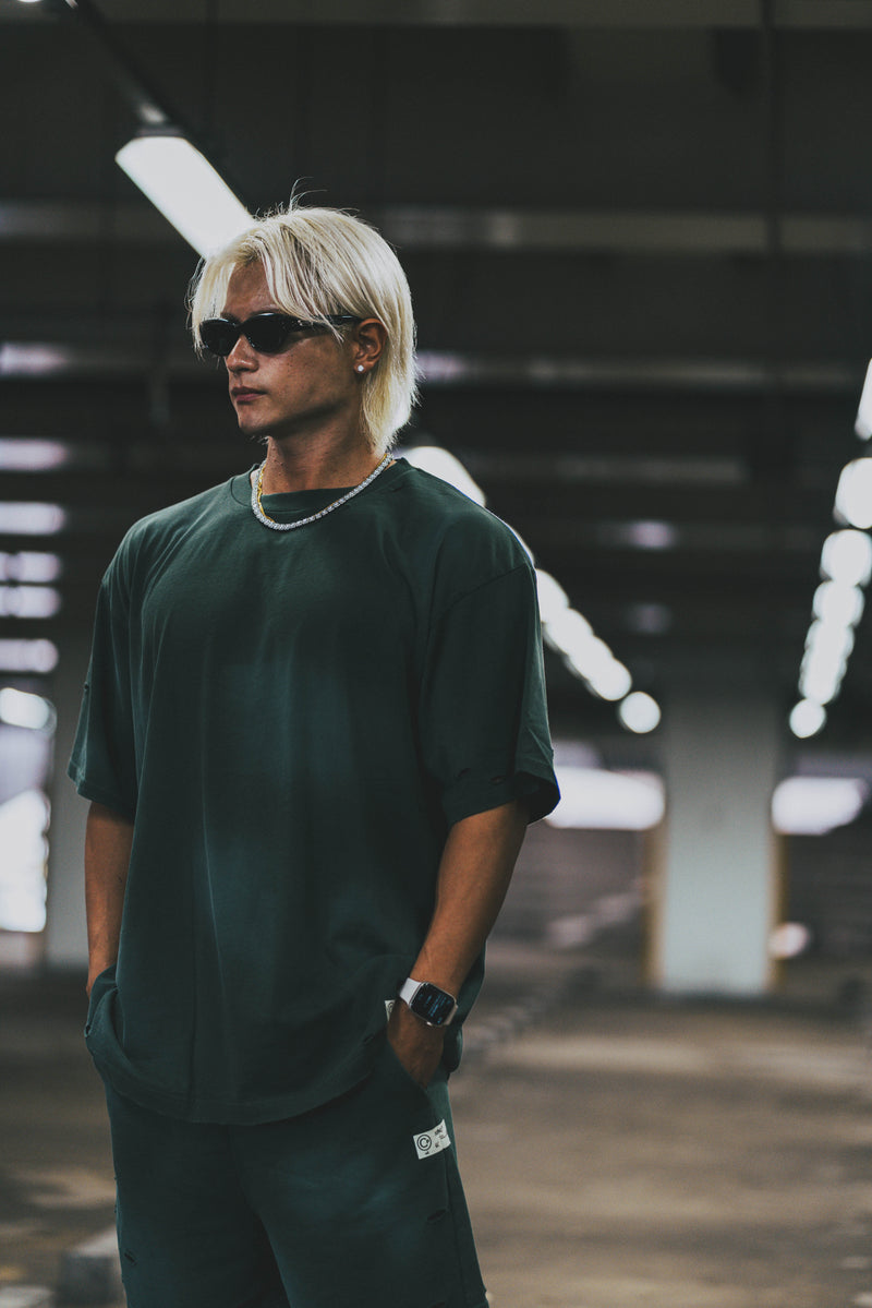 XENO DAMAGE SWEAT SHORT PANTS GREEN