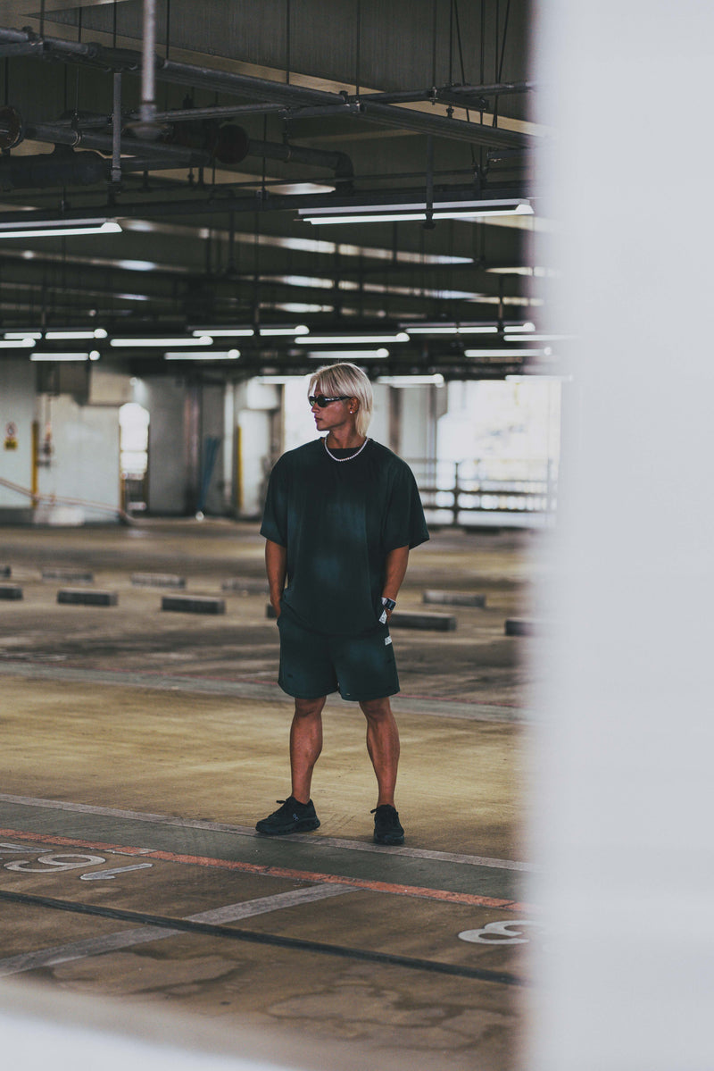 XENO DAMAGE SWEAT SHORT PANTS GREEN