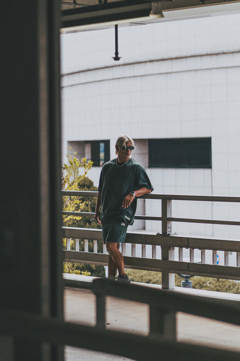 XENO DAMAGE SWEAT SHORT PANTS GREEN