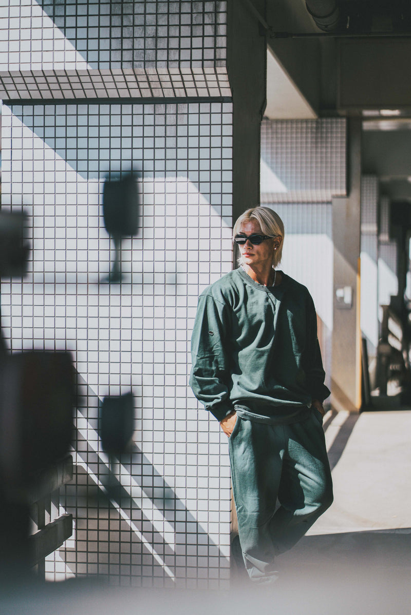 XENO DAMAGE SWEAT PANTS GREEN