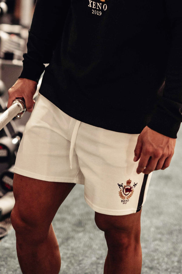 XENO HERITAGE EMBLEM SHORTS OffWhite